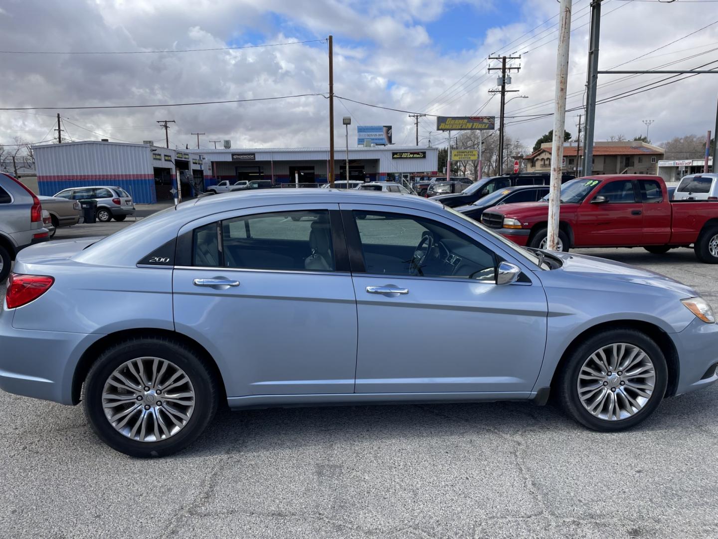 2012 Chrysler 200 Limited (1C3CCBCG2CN) with an 3.6L V6 DOHC 24V FFV engine, 6-Speed Automatic transmission, located at 44356 Date Ave., Lancaster, CA, 93534, (661) 945-6555, 34.688919, -118.139374 - Photo#2